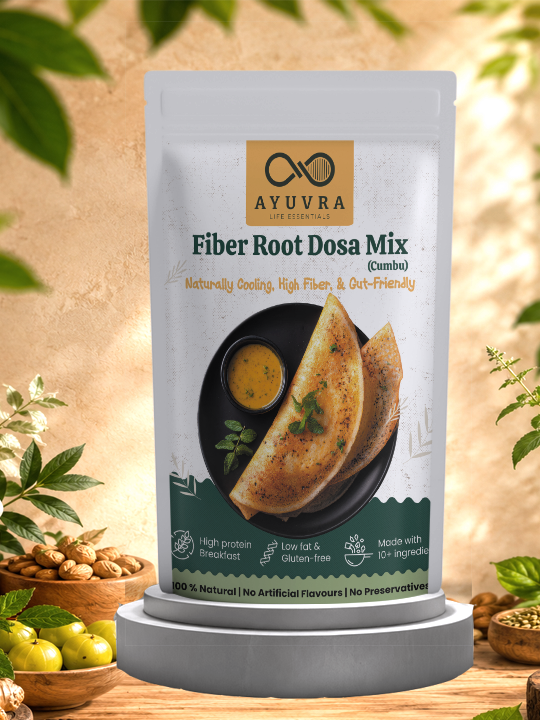 Packaging of Ayuvra Fiber Root Dosa Mix with a background of green leaves and wooden bowls.